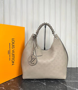 Louis Vuitton Mahina Carmel Bag