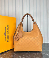 Louis Vuitton Mahina Carmel Bag