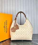 Louis Vuitton Mahina Carmel Bag
