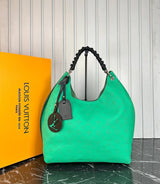 Louis Vuitton Mahina Carmel Bag