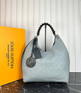 Louis Vuitton Mahina Carmel Bag