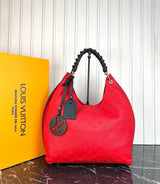 Louis Vuitton Mahina Carmel Bag