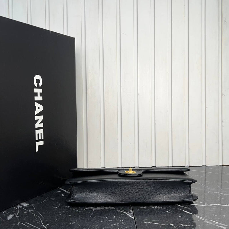 Chanel Maxi Clutch