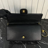 Chanel Maxi Clutch