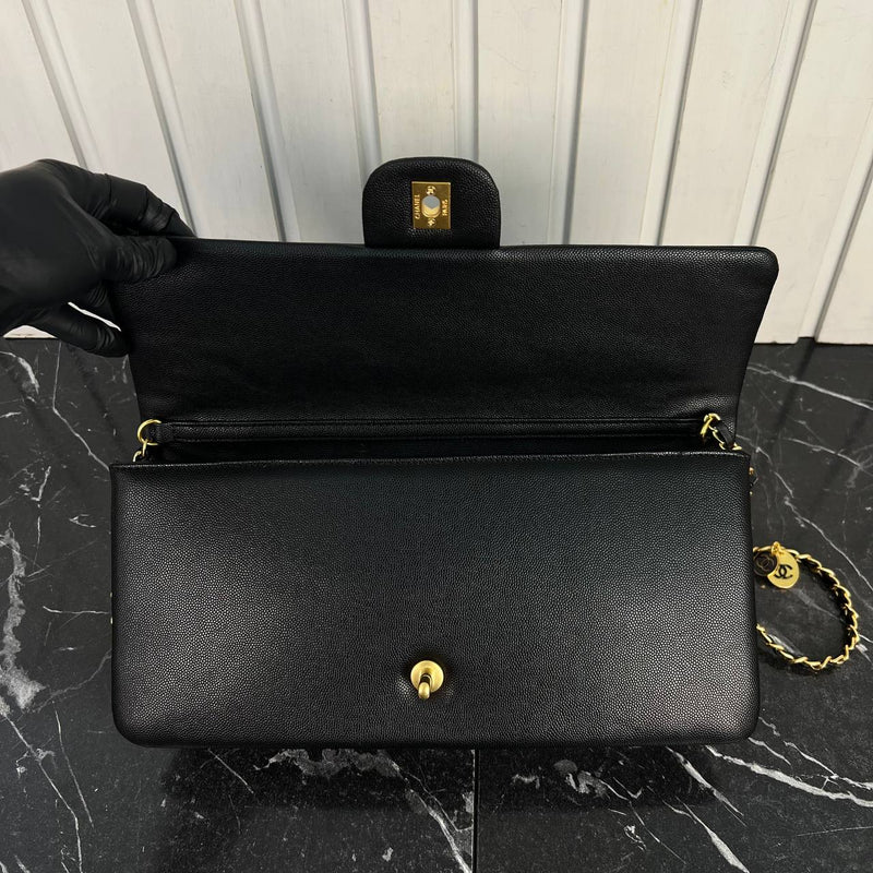 Chanel Maxi Clutch